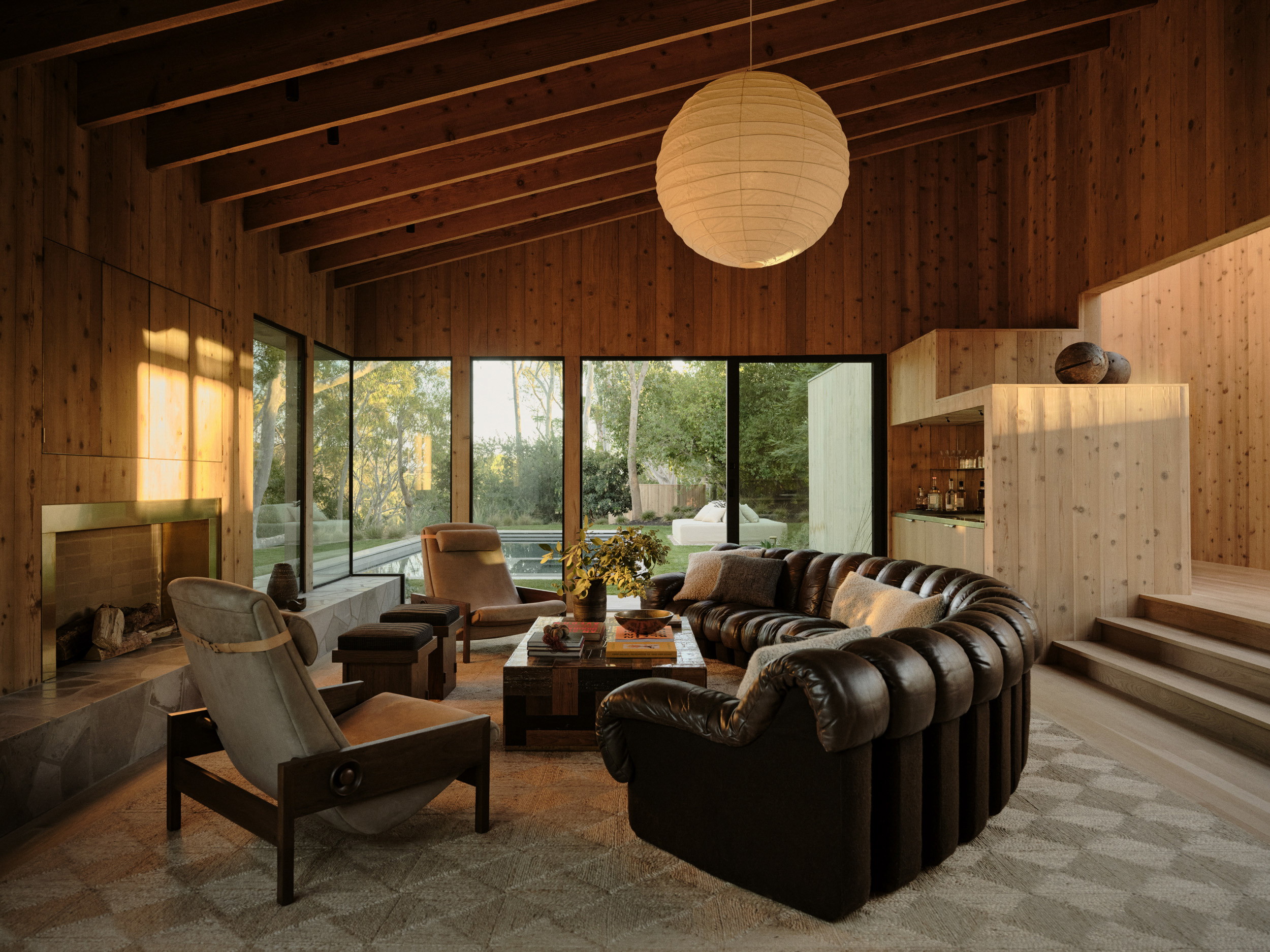 a living room filled with furniture and a fire place