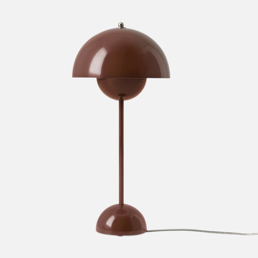 a brown lamp on a white background