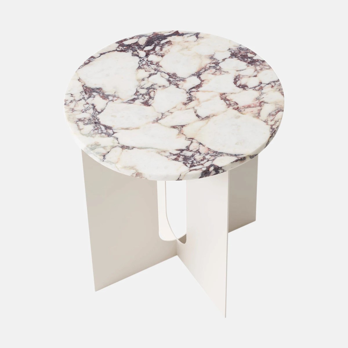 a white marble table with a white base