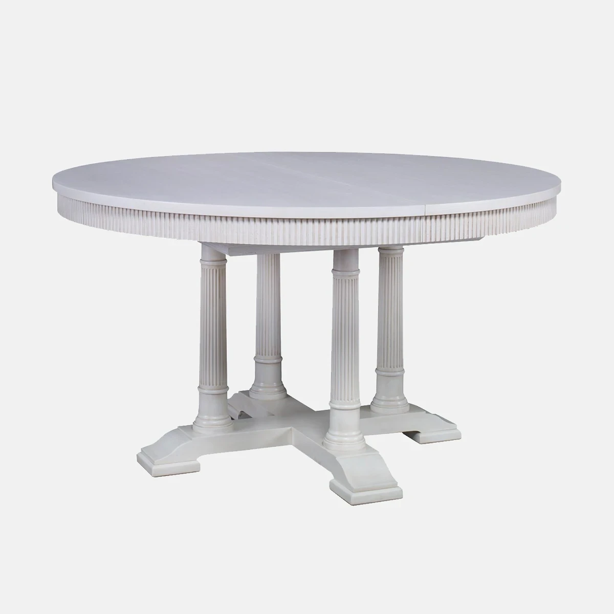a white table with columns and a round table top