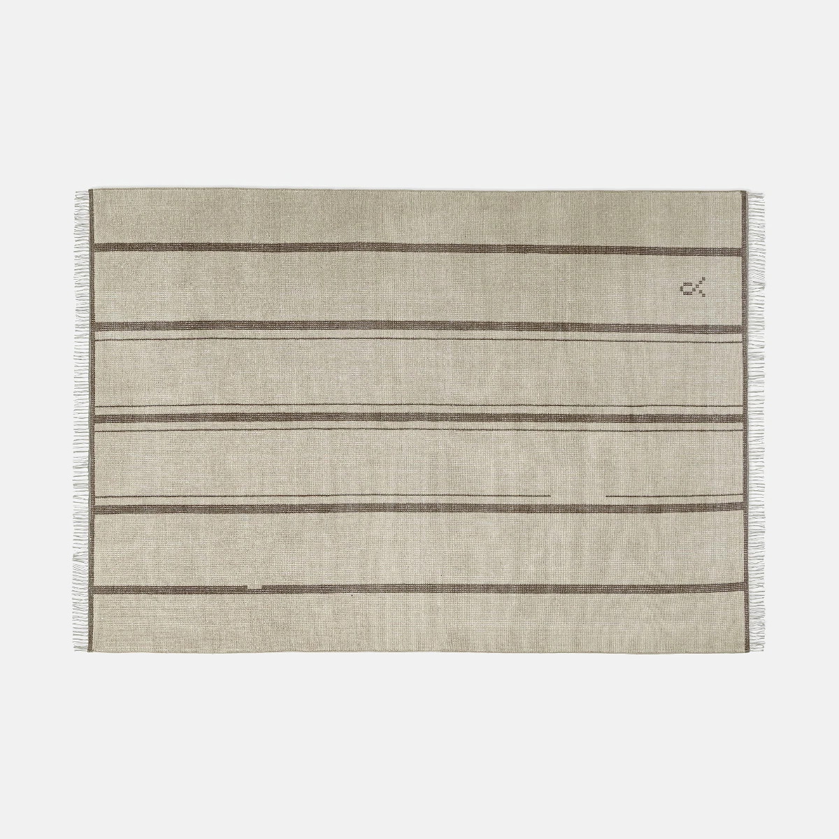 a beige and brown striped rug on a white background