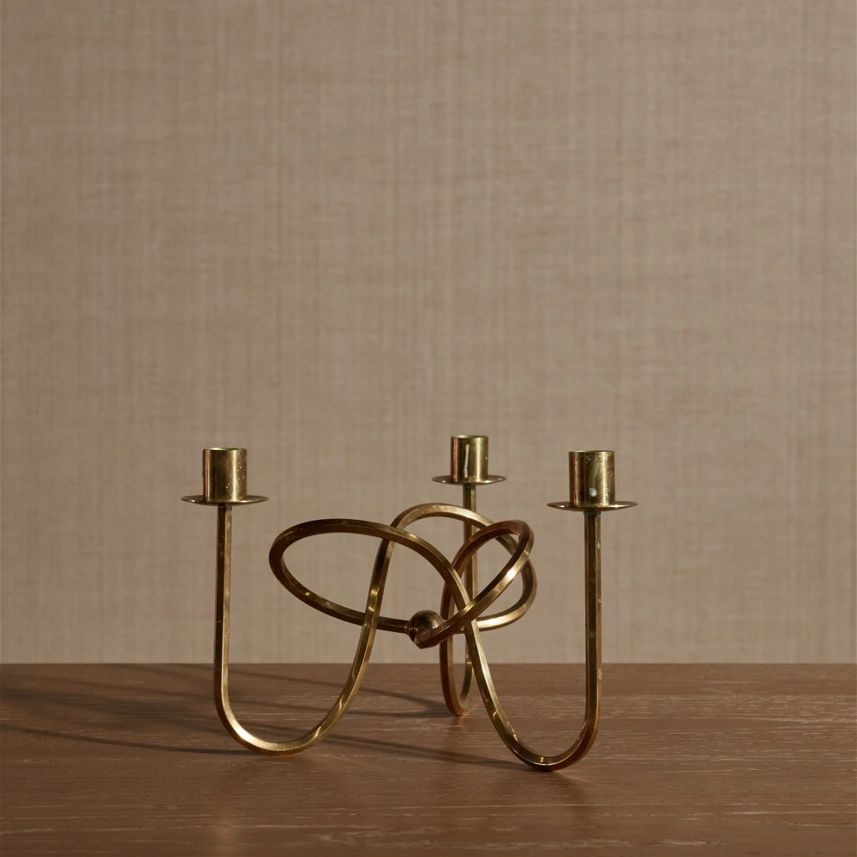 The image of an Josef Frank Friendship Knot Brass Candlestick product