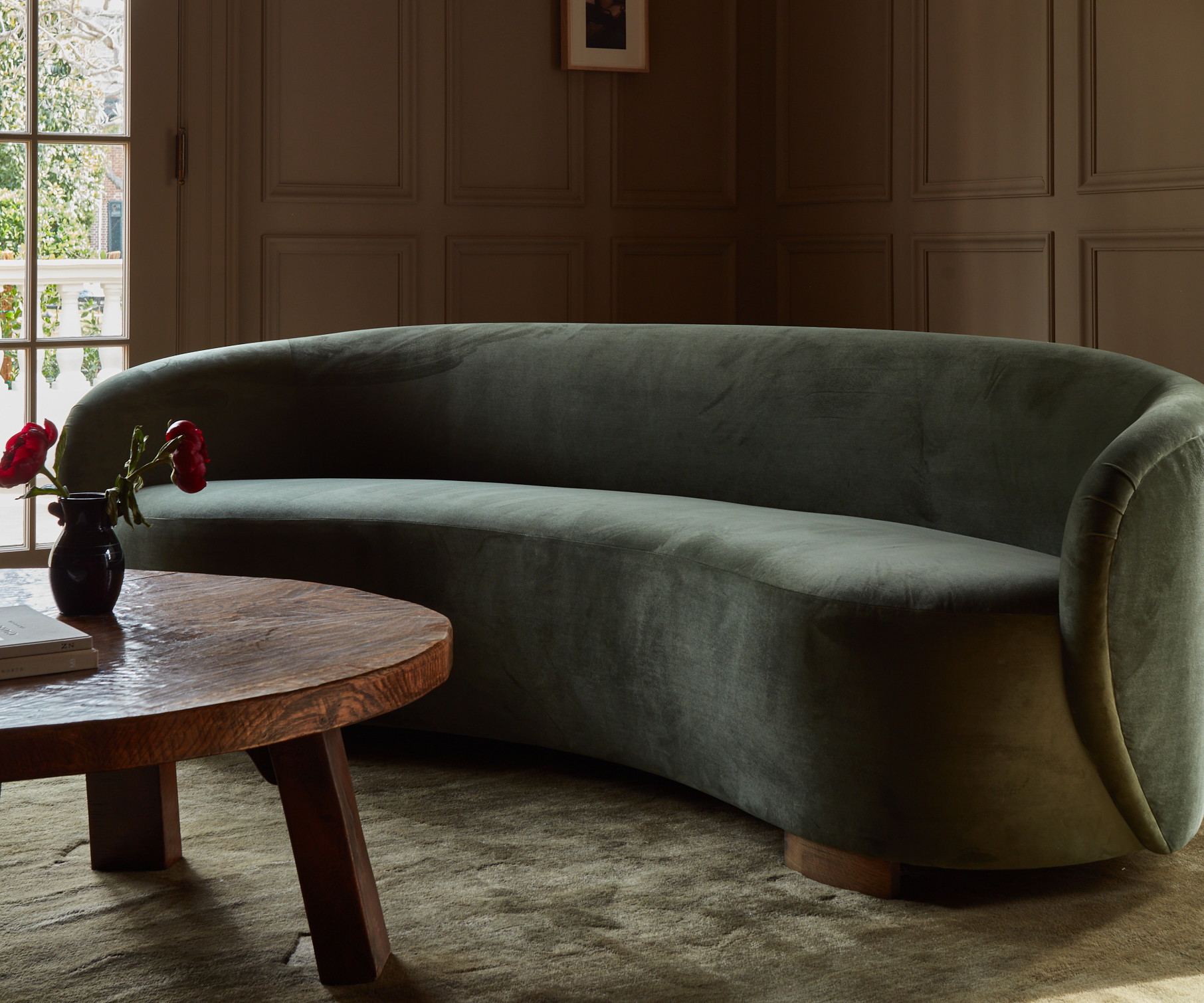 a living room with a couch and a table