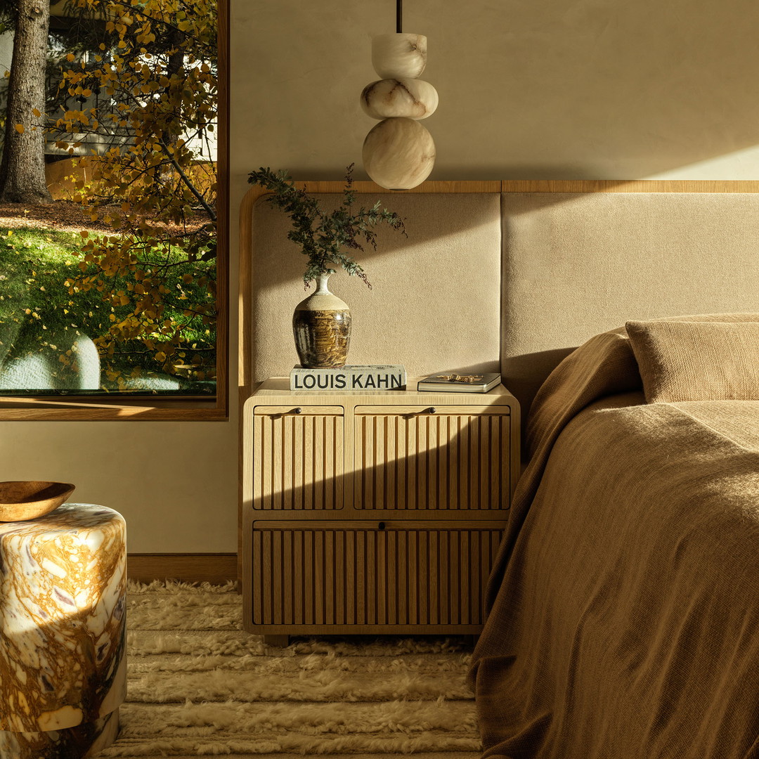 a bed room with a neatly made bed and a window