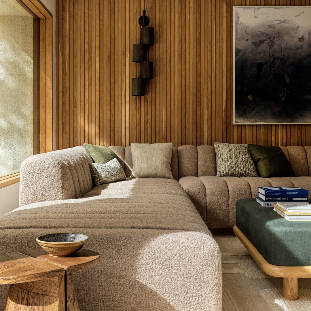 a living room with a large sectional couch