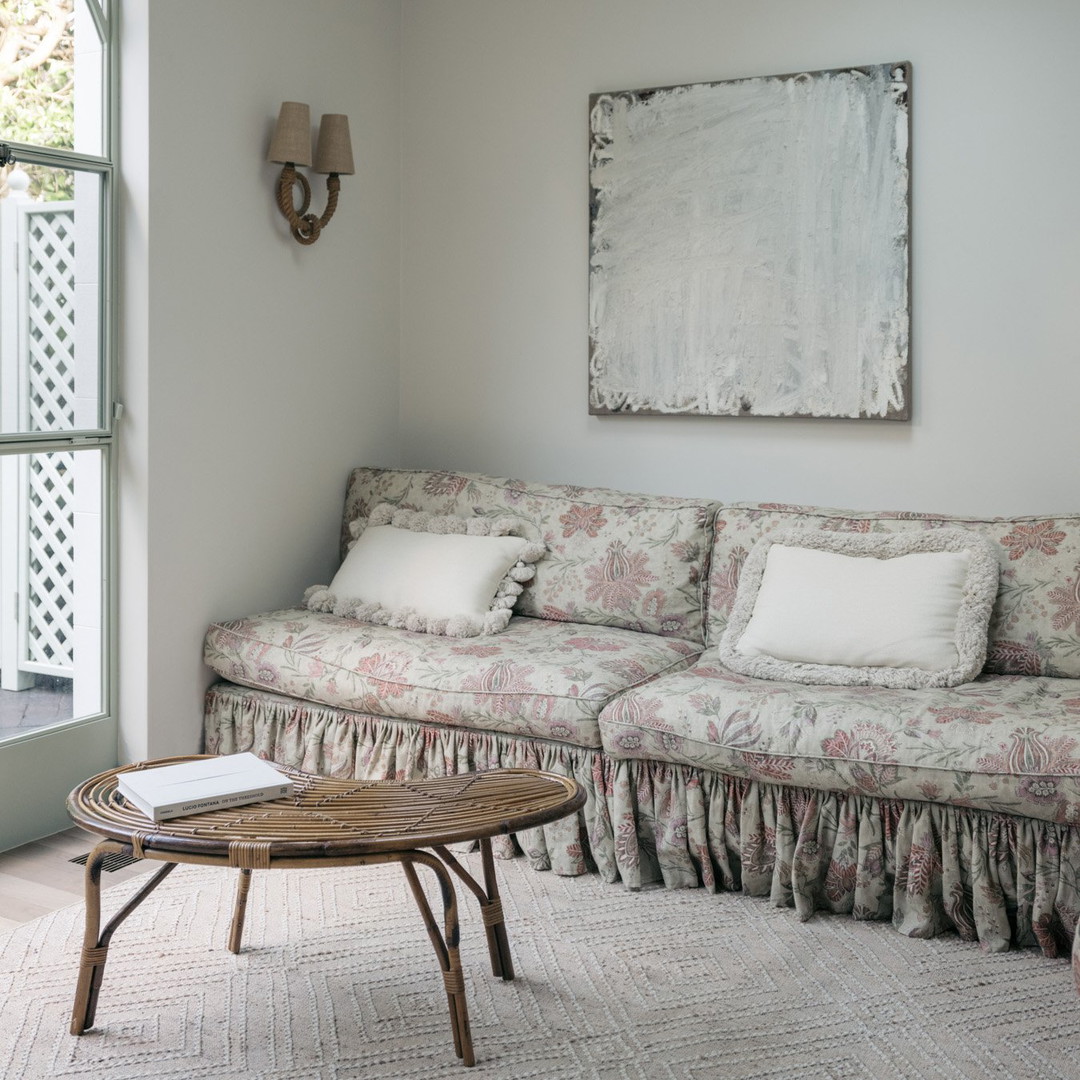 a living room with a couch and a coffee table