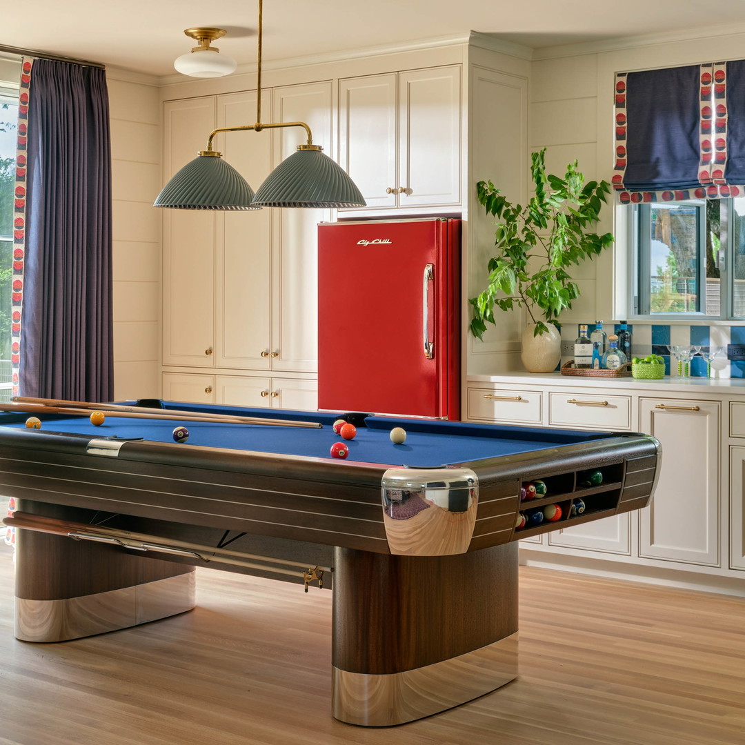 a pool table in the middle of a room