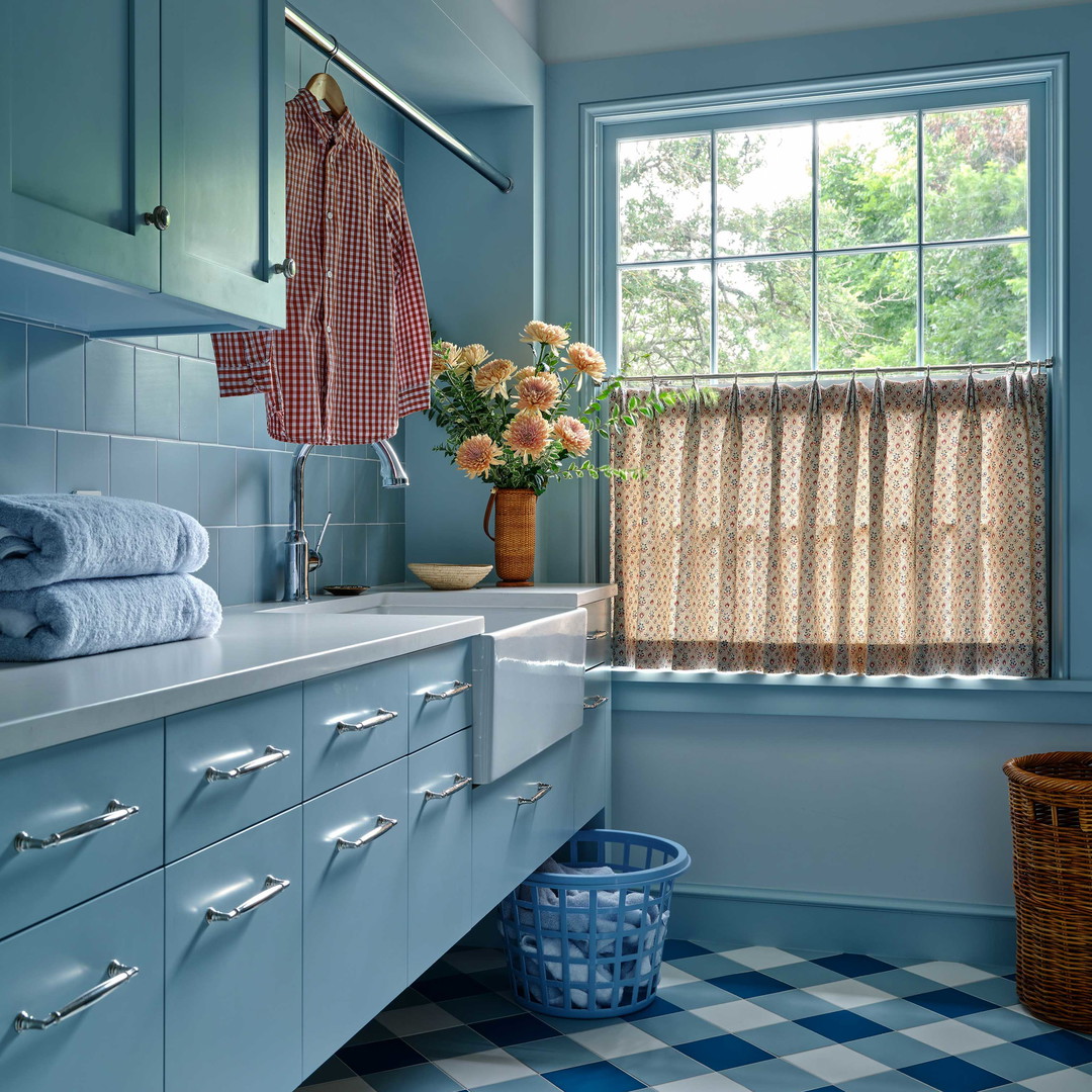 a blue and white checkered floor in a bathroom