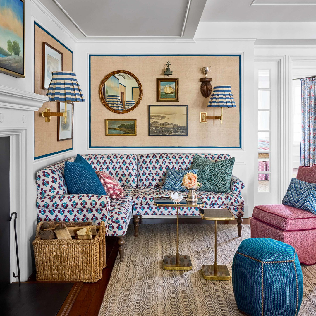 a living room filled with furniture and a fire place