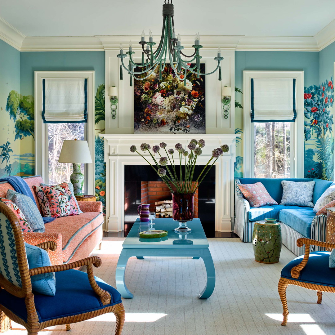 a living room filled with furniture and a fire place