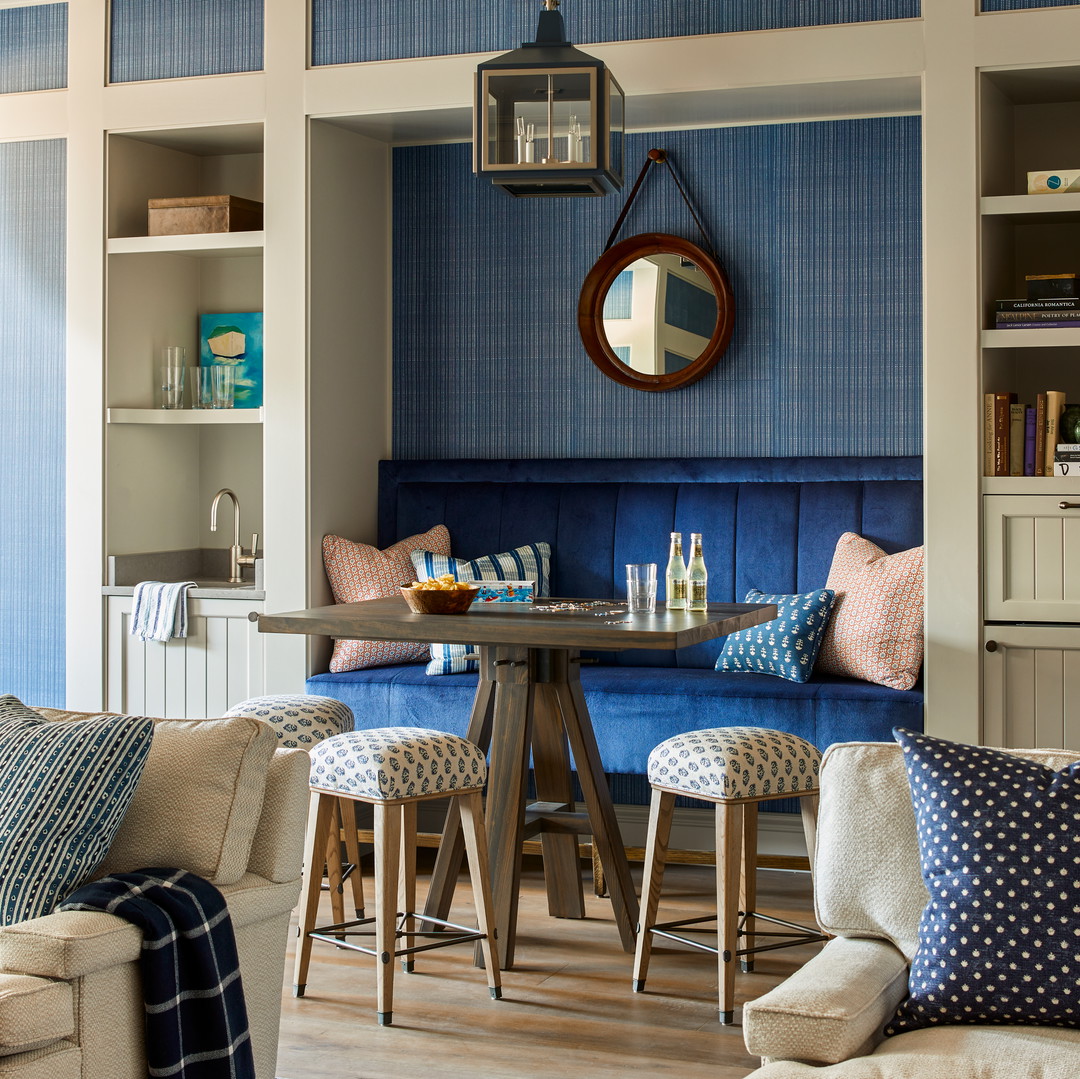 a living room filled with furniture and a table