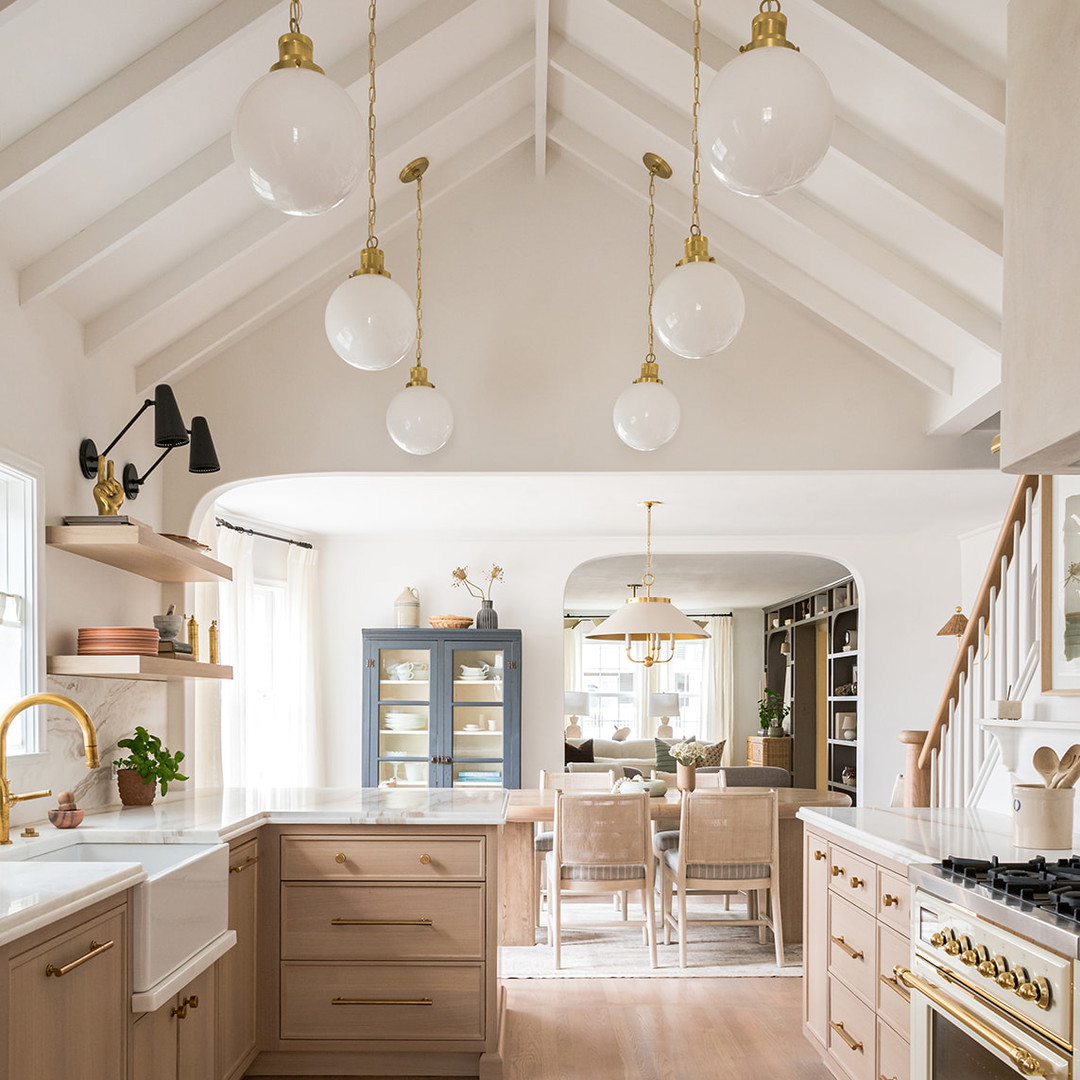 a kitchen with a rug on the floor