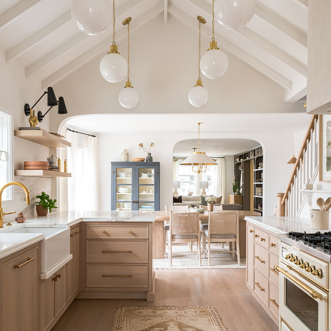 a kitchen with a rug on the floor