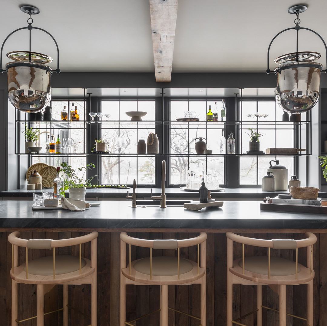 a large kitchen with a center island and lots of counter space