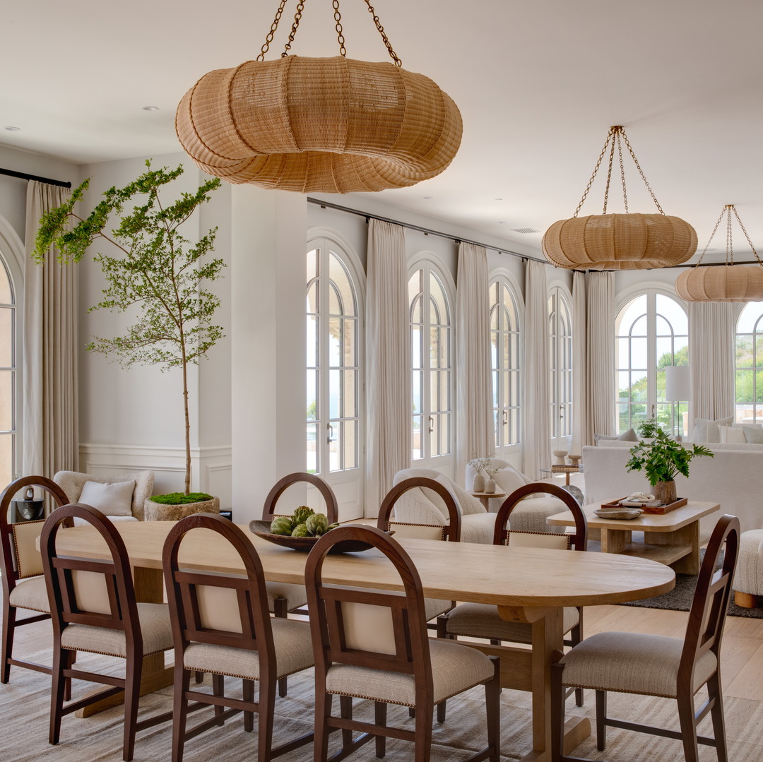 a dining room with a lot of chairs and a table