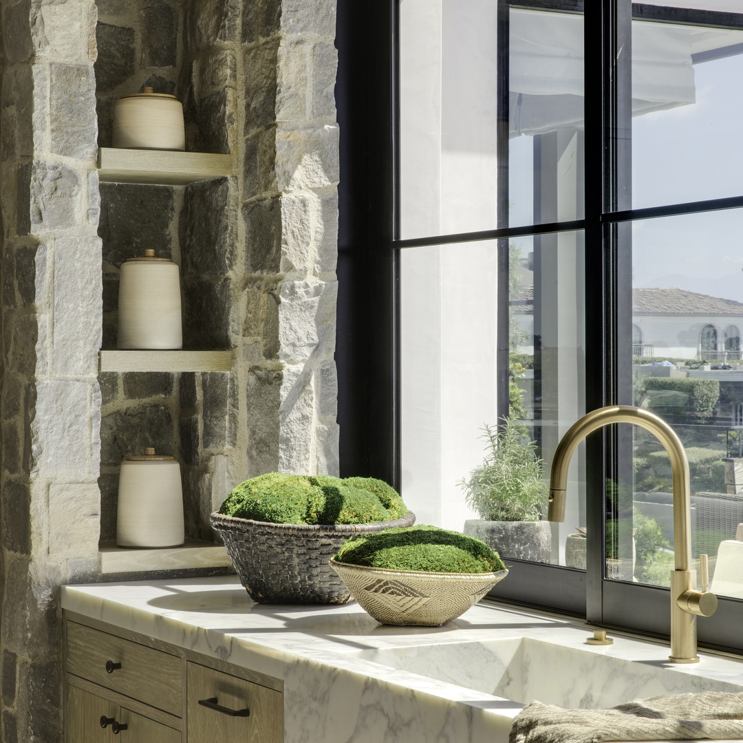 a kitchen with a sink and a window