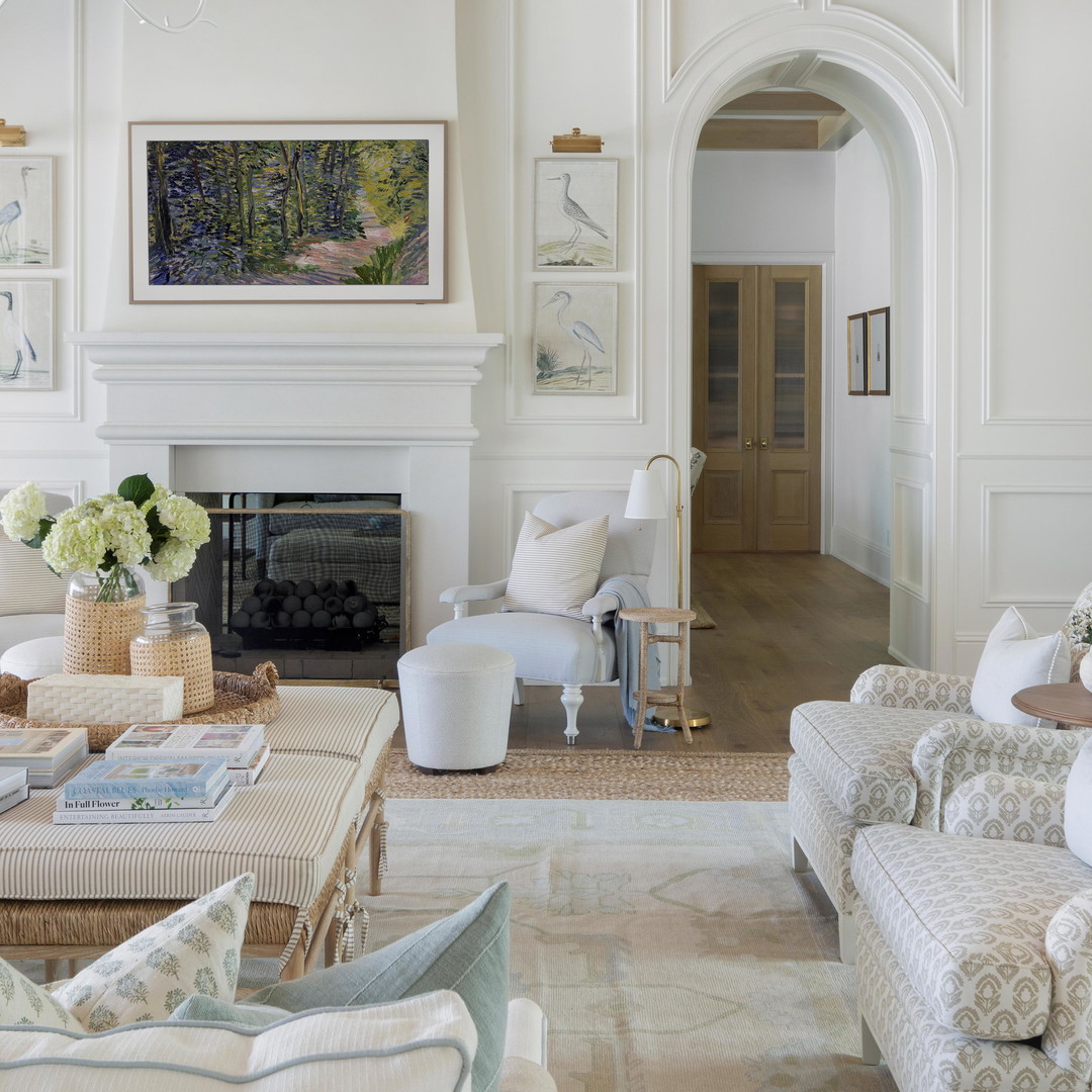 a living room filled with furniture and a fire place