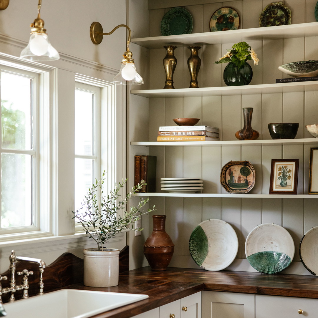 a kitchen with a sink and a window