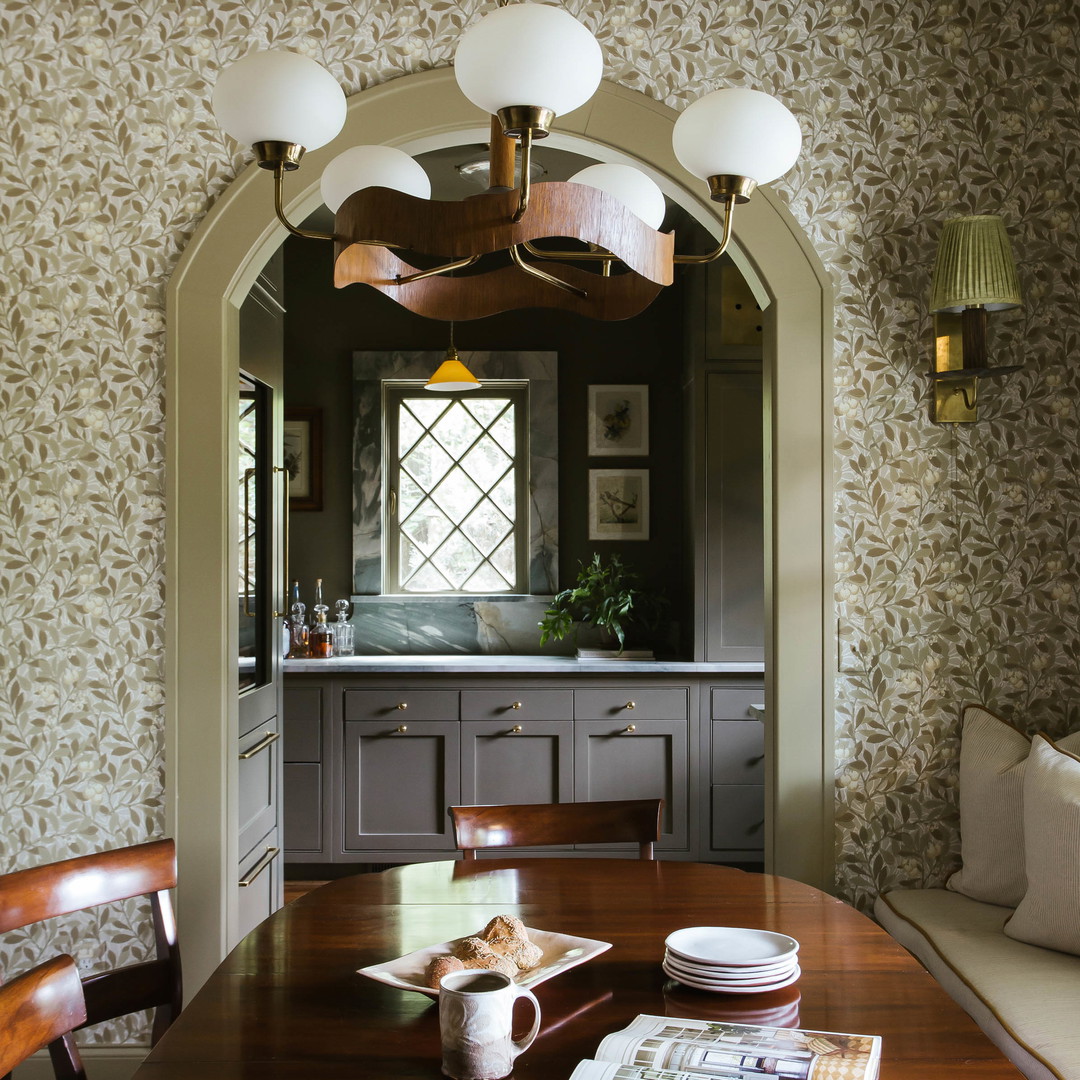 a dining room table with a magazine on it