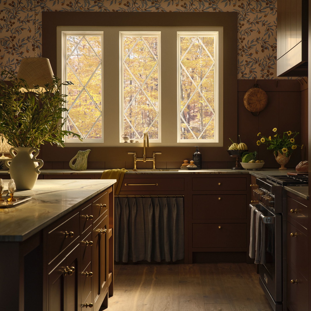 a kitchen with a sink, stove and a window