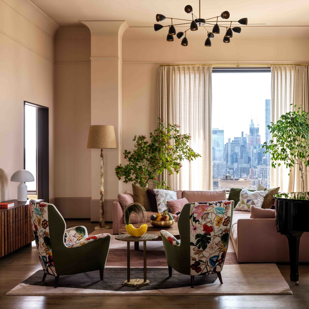 a living room filled with furniture and a piano