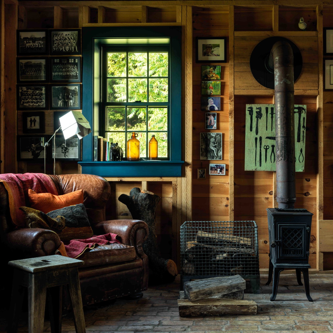 a living room filled with furniture and a fire place