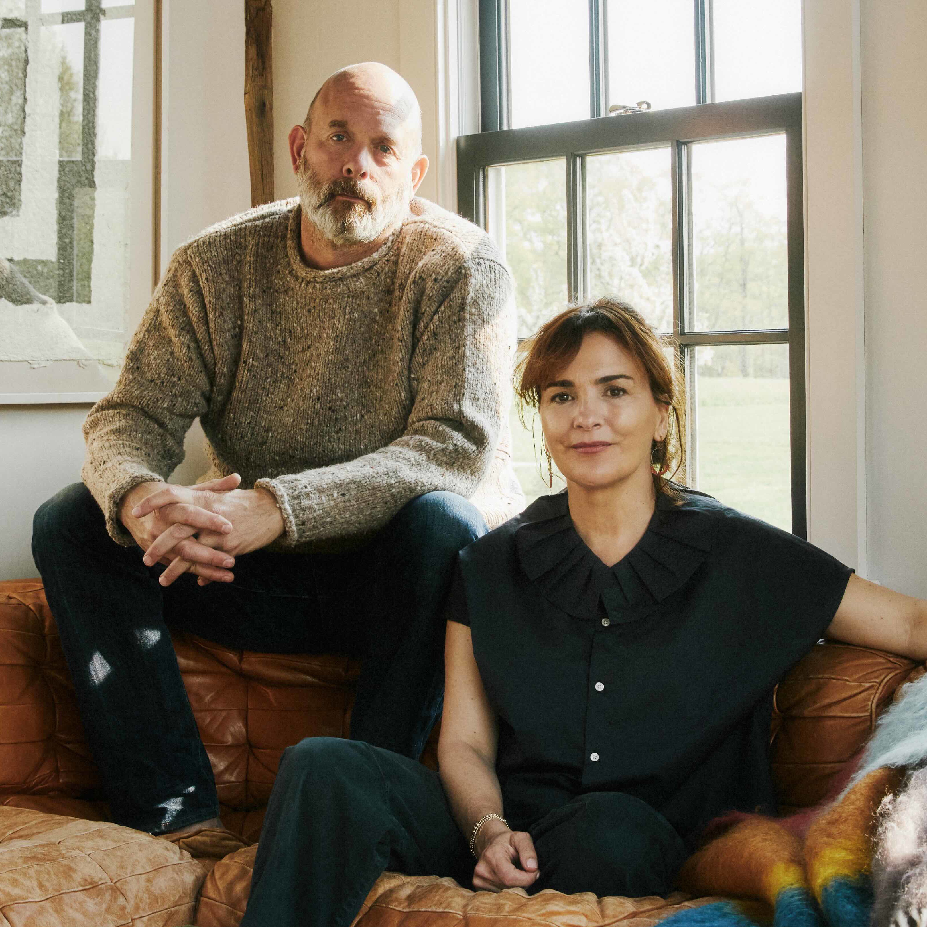 a man and a woman sitting on a couch