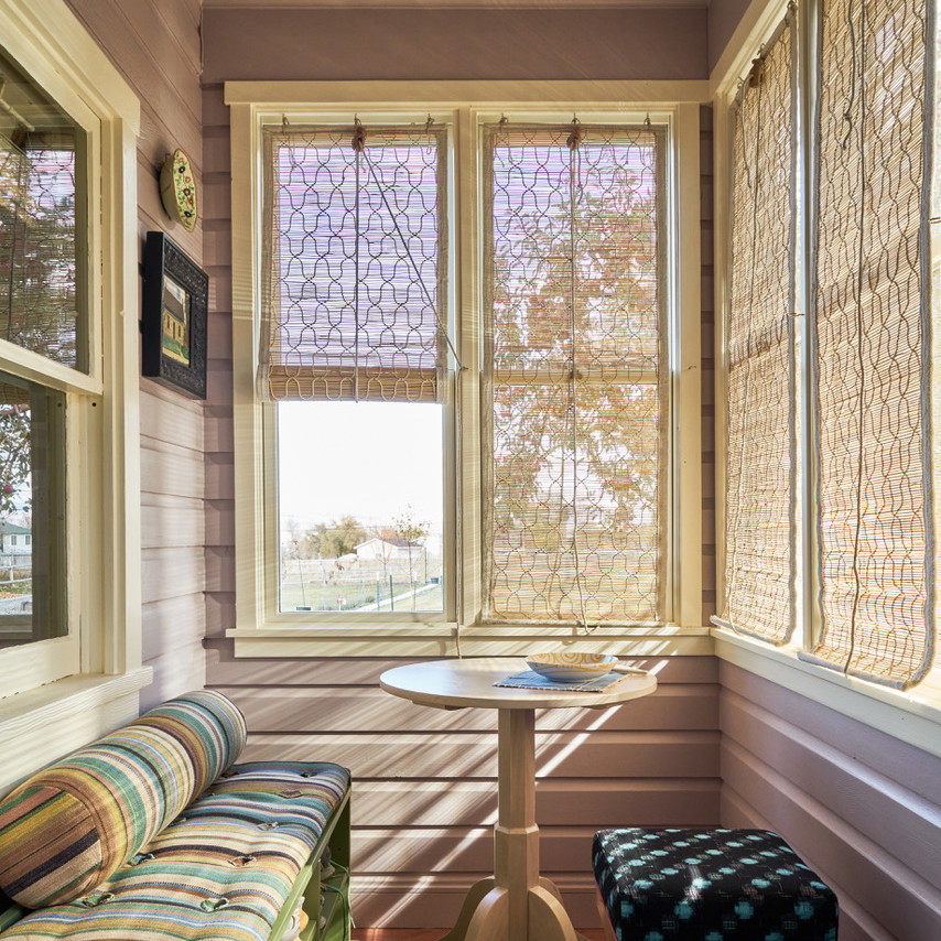 a room with a bench and a table