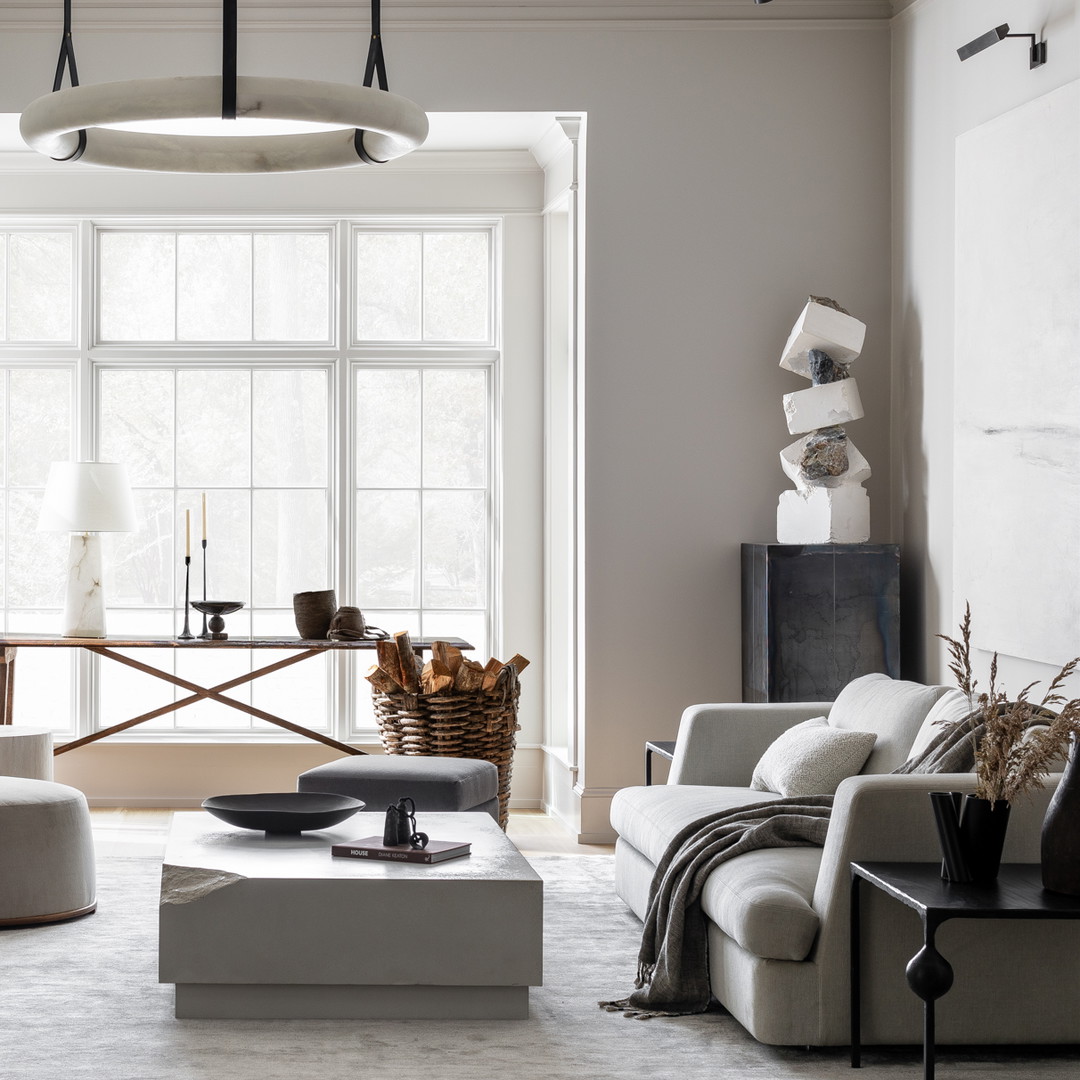 a living room filled with furniture and a fire place