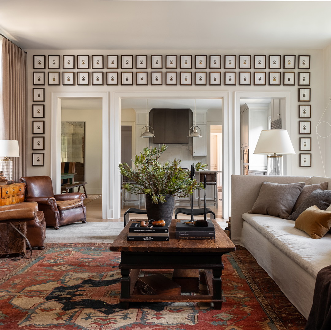 a living room filled with furniture and a fire place