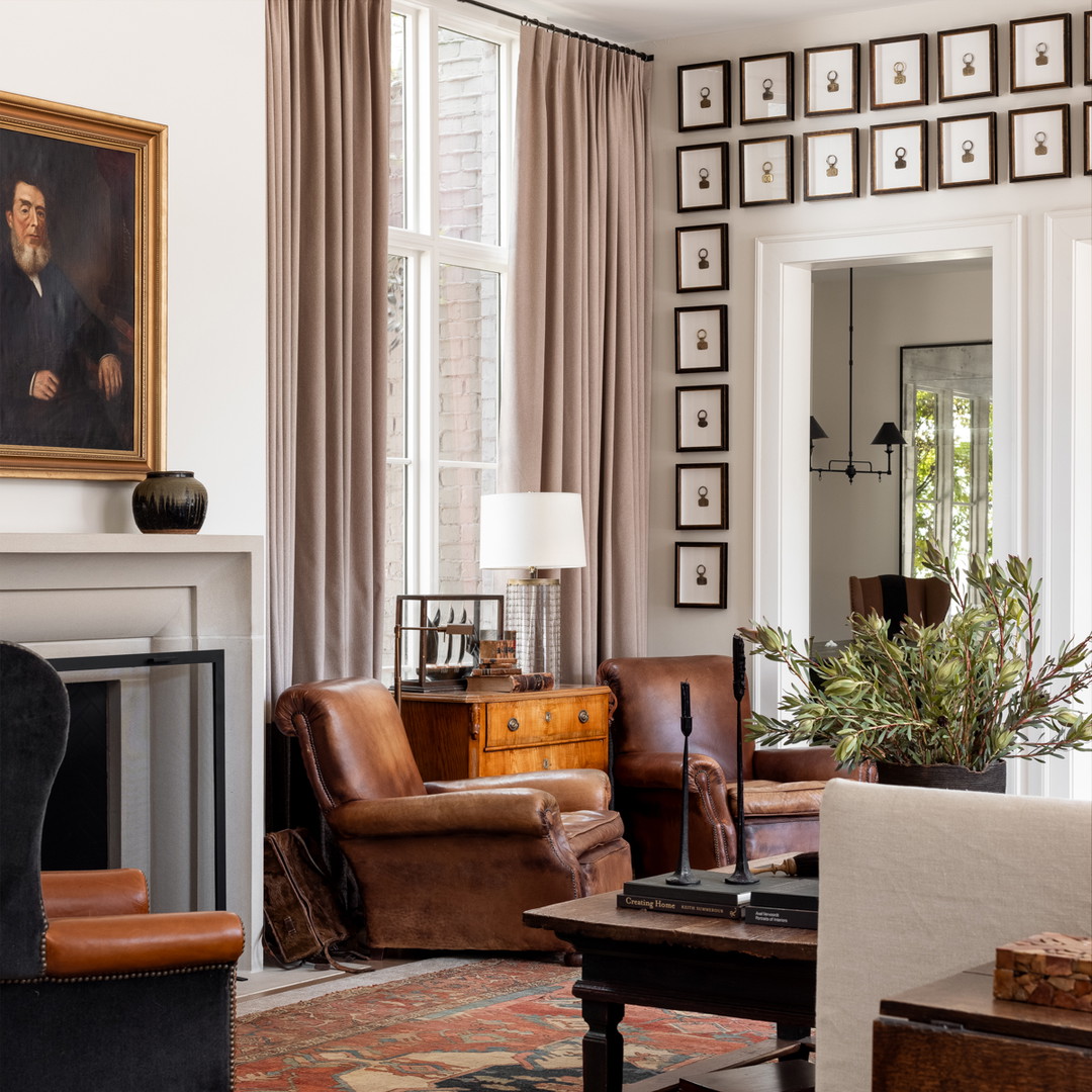 a living room filled with furniture and a fire place