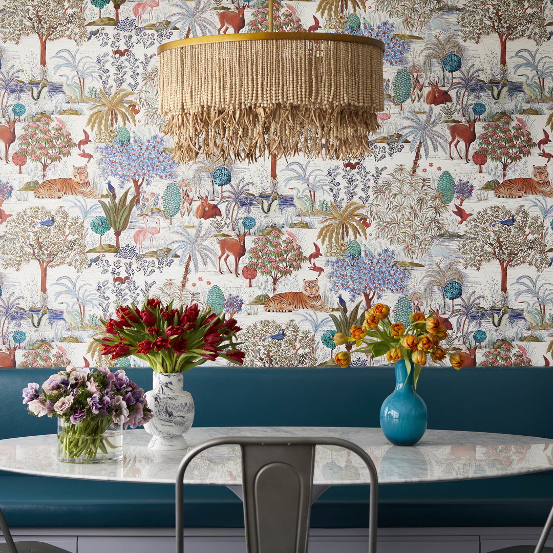 a dining room with a table and chairs