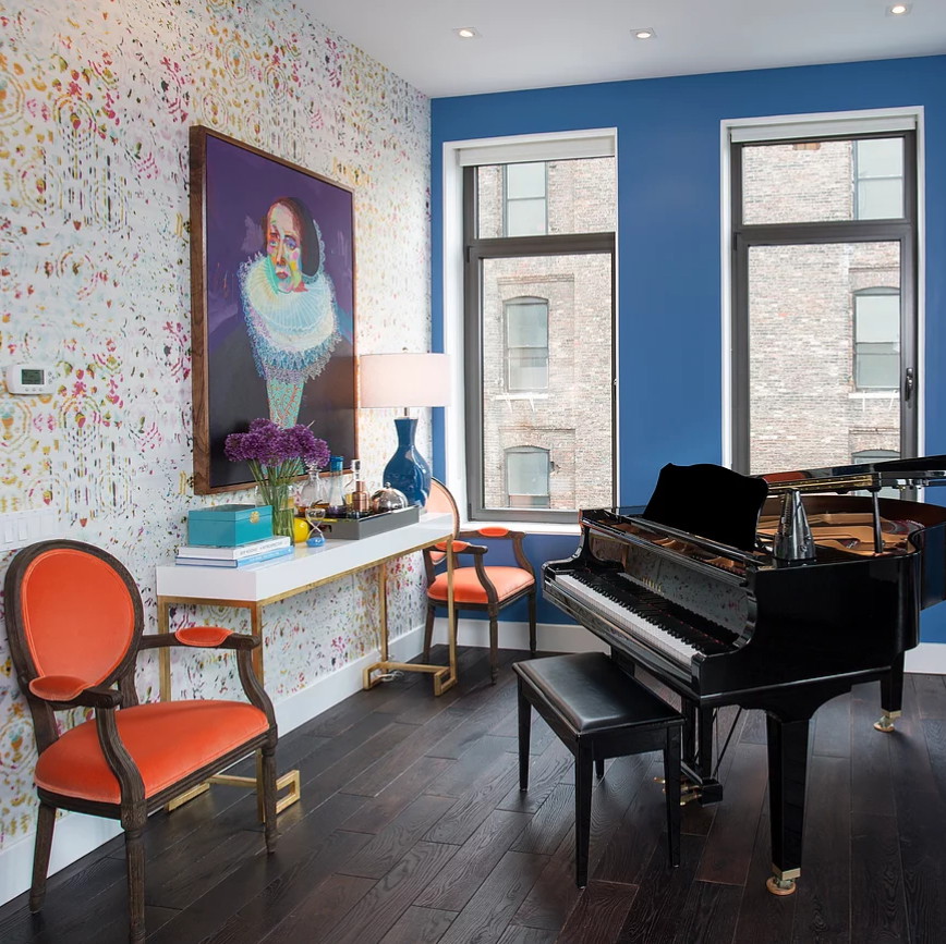 a living room filled with furniture and a piano