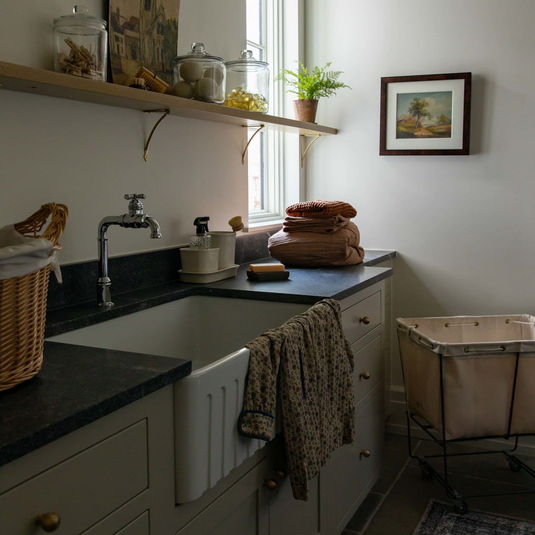 a kitchen with a sink and a window