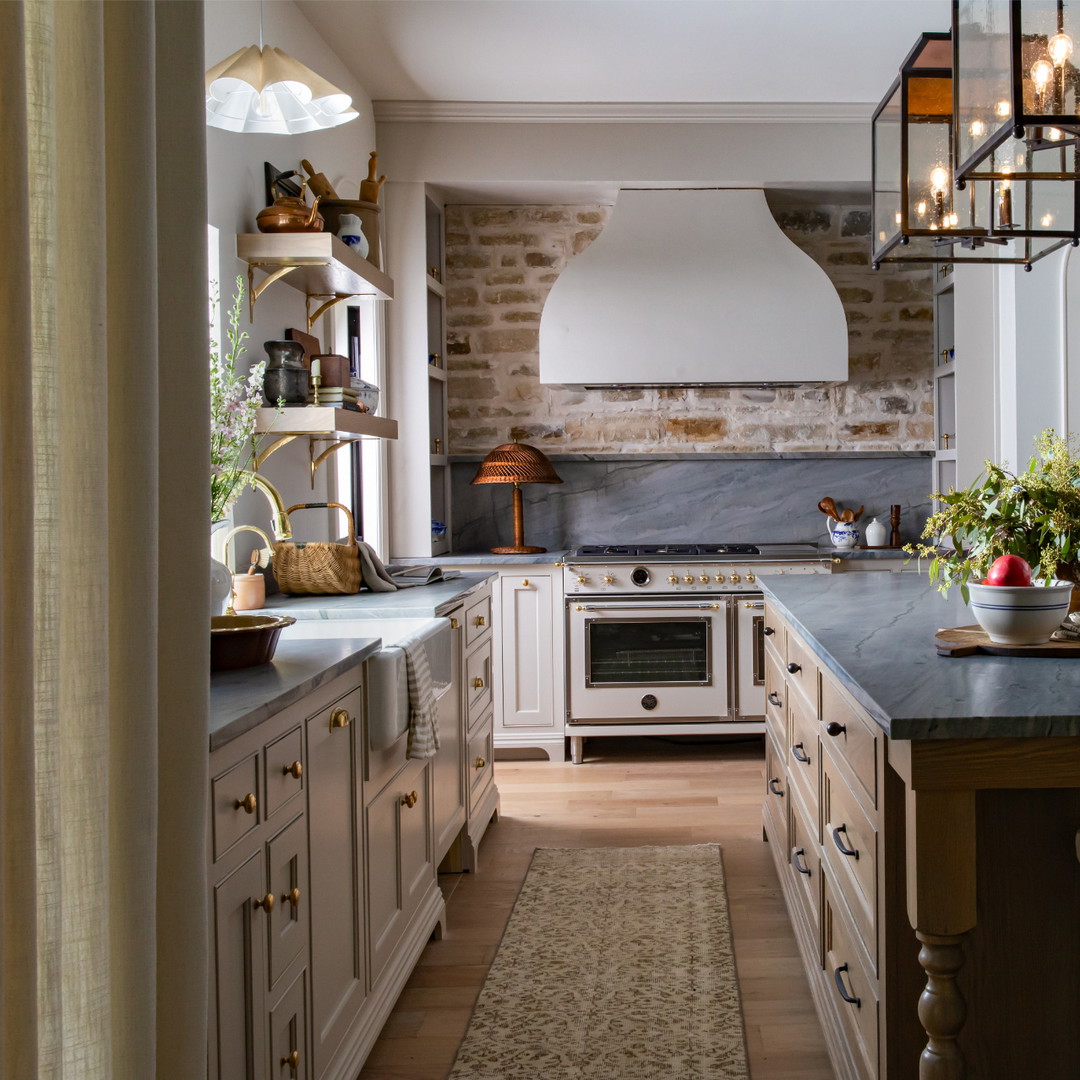 a kitchen with an island and a stove