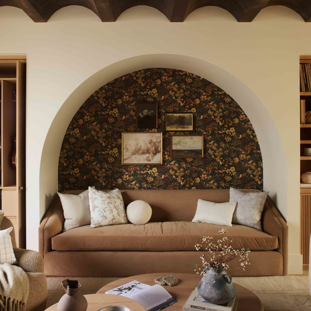 a living room filled with furniture and a fire place