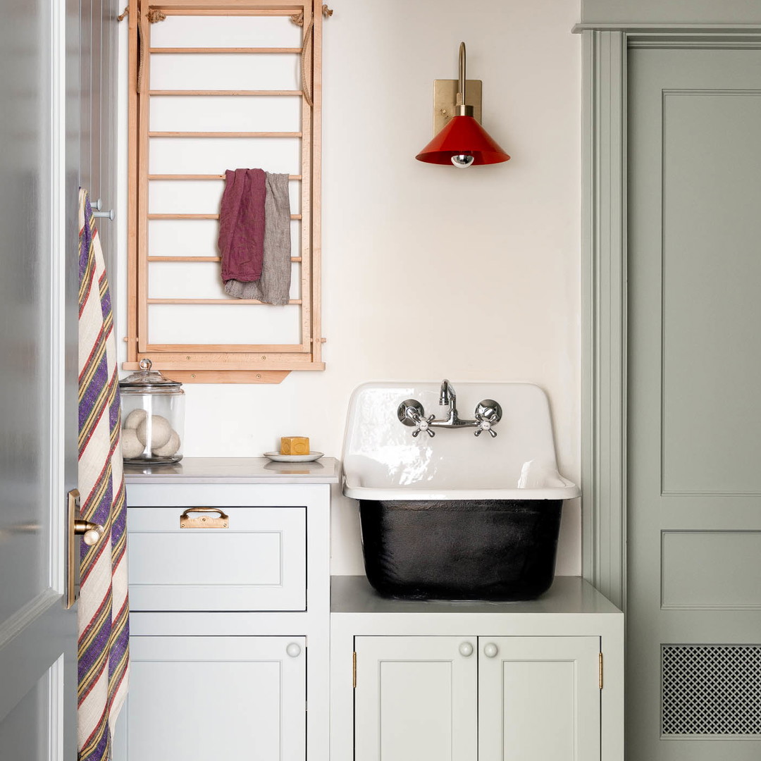 a bathroom with a sink and a towel rack