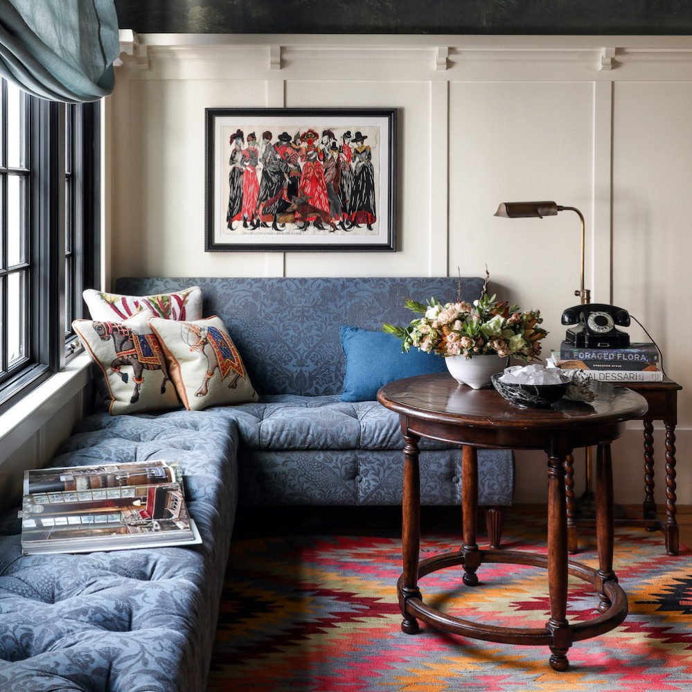 a living room with a couch and a table