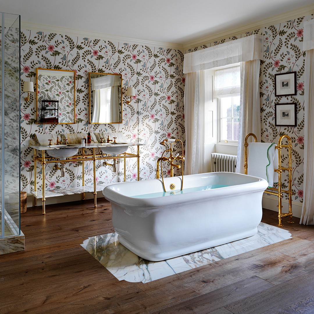 a bathroom with a tub and a sink