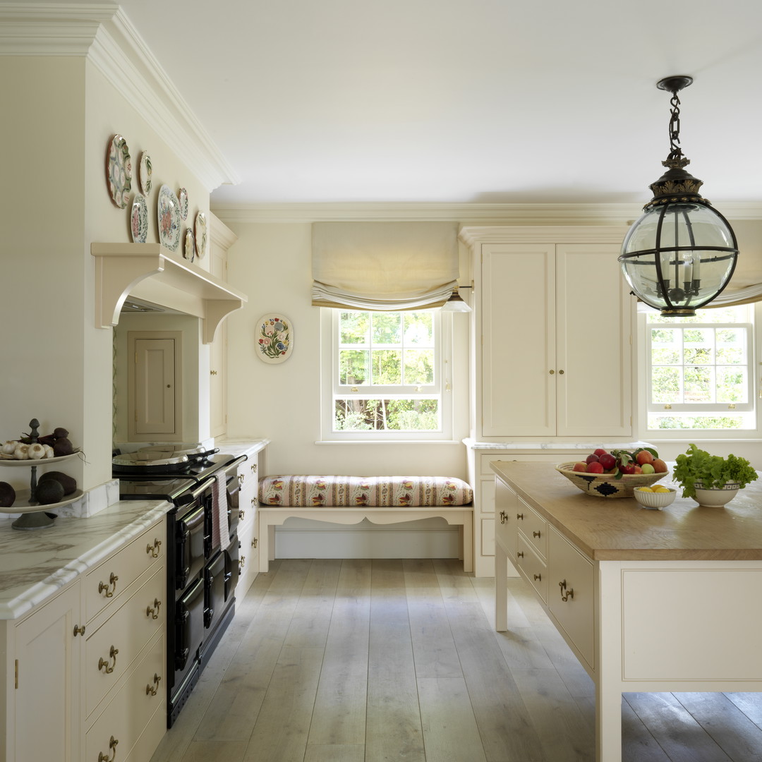 a kitchen with a stove top oven sitting inside of it