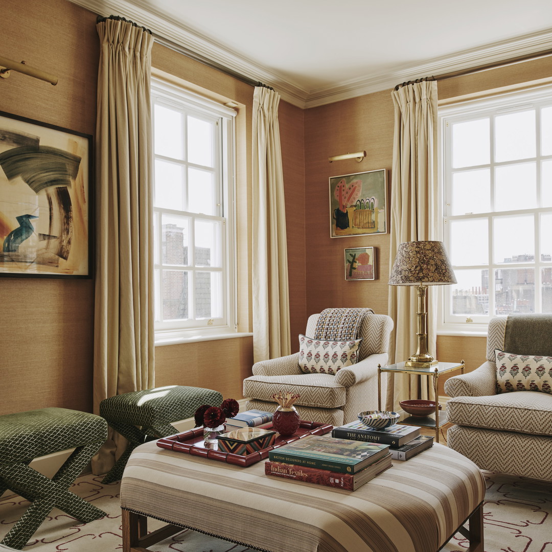 a living room filled with furniture and a fire place