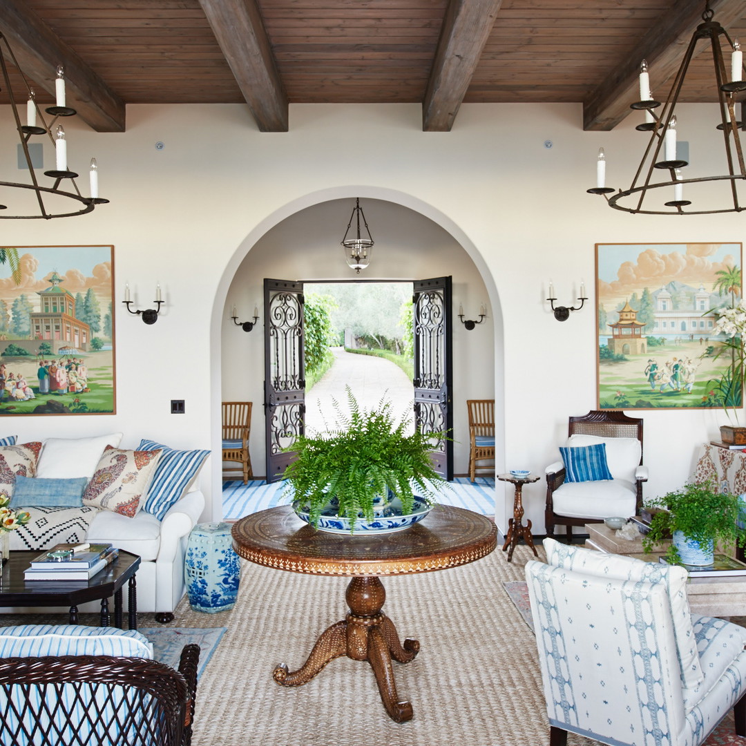 a living room with blue and white furniture