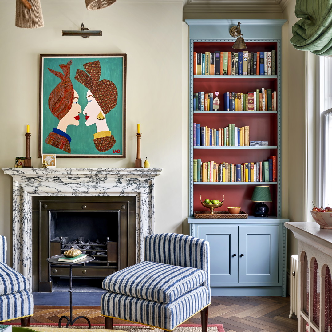 a living room filled with furniture and a fire place