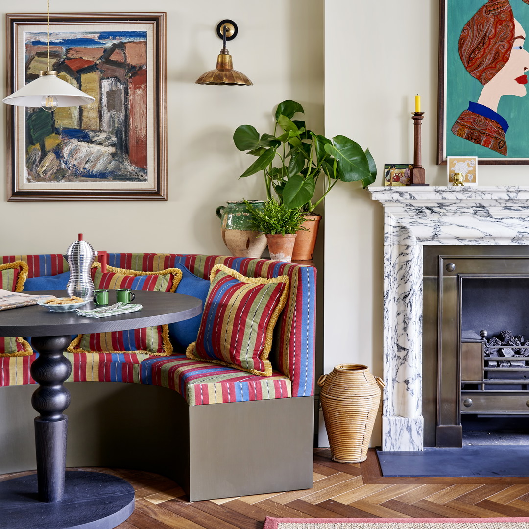 a living room filled with furniture and a fire place