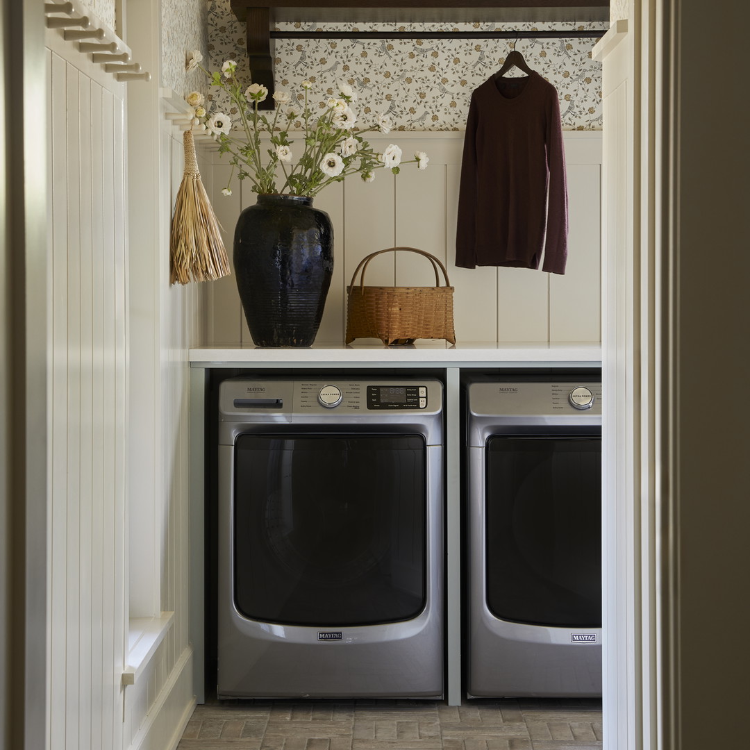 a washer and dryer in a small room