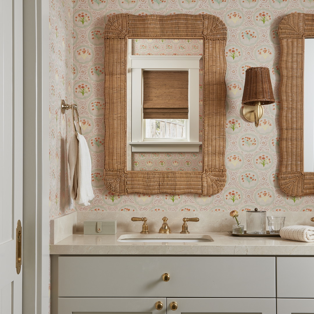 a bathroom with two sinks and a mirror