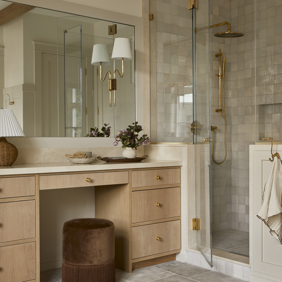 a bath room with a sink a mirror and a bath tub