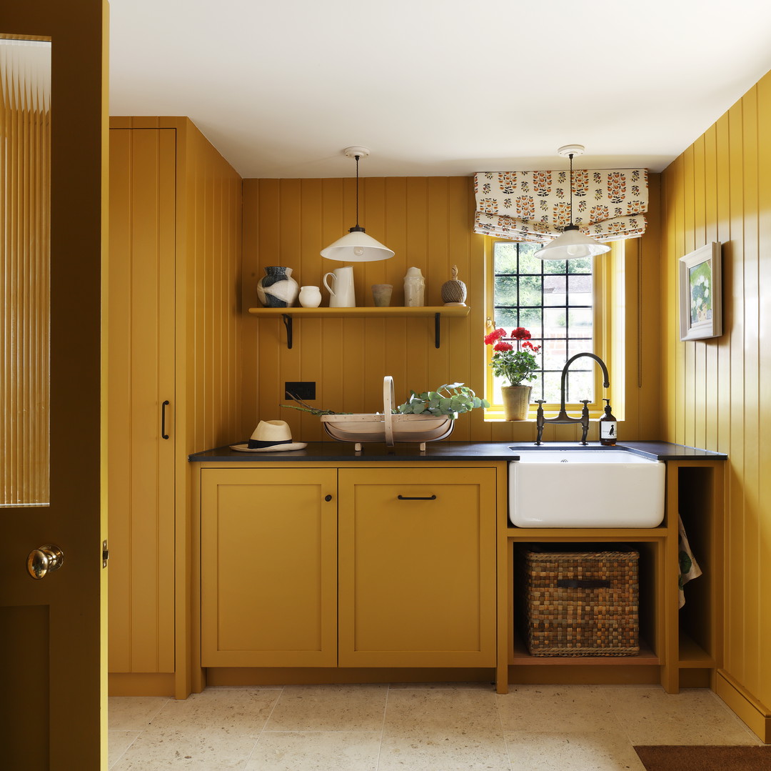 a kitchen with a sink and a window