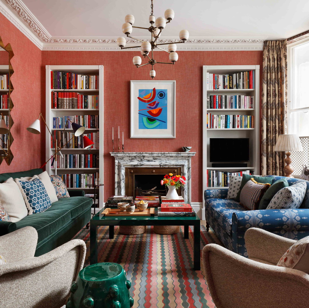 a living room filled with furniture and a fire place