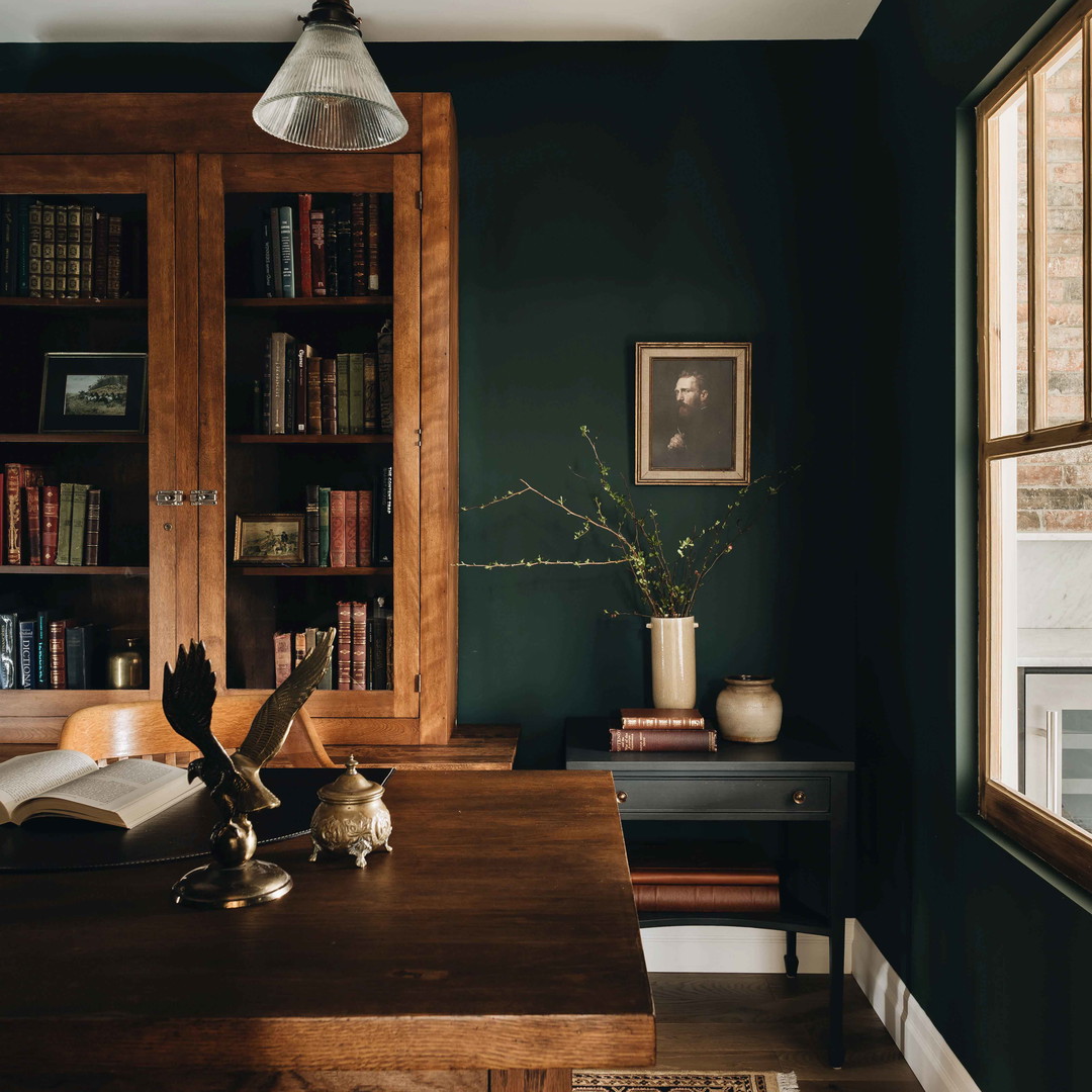 a table with a book on it in a room